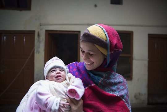 Sobia Sajid along with her newly born baby Ahmed Sajid at their residence after nine days since her delivery where she suffered from postpartum haemorrhaging and was given Tranxamin on March 14, 2019 in Rawalpindi, Pakistan. Saiyna Bashir © Wellcome Trust
